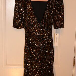 Calvin Klein sequined faux-wrap dress.